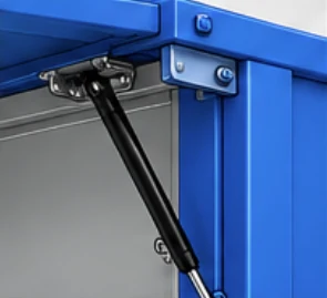 Close-up of a top hinge bracket and gas strut on a side panel